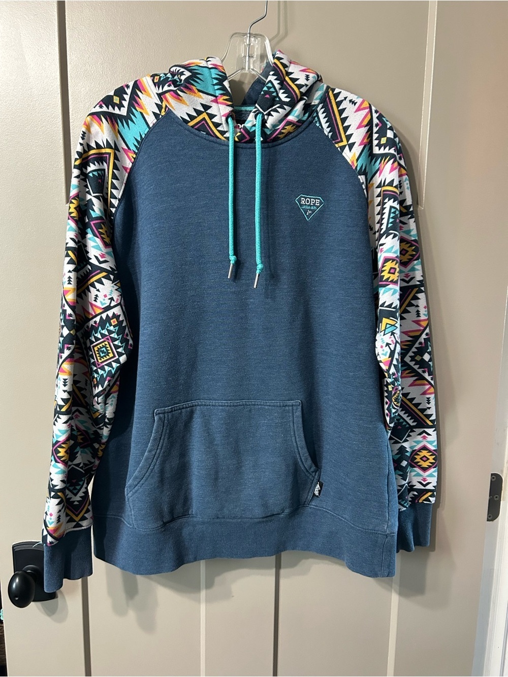 Hooey Blue hoodie with Aztec-Print Sleeves “rope like a girl”